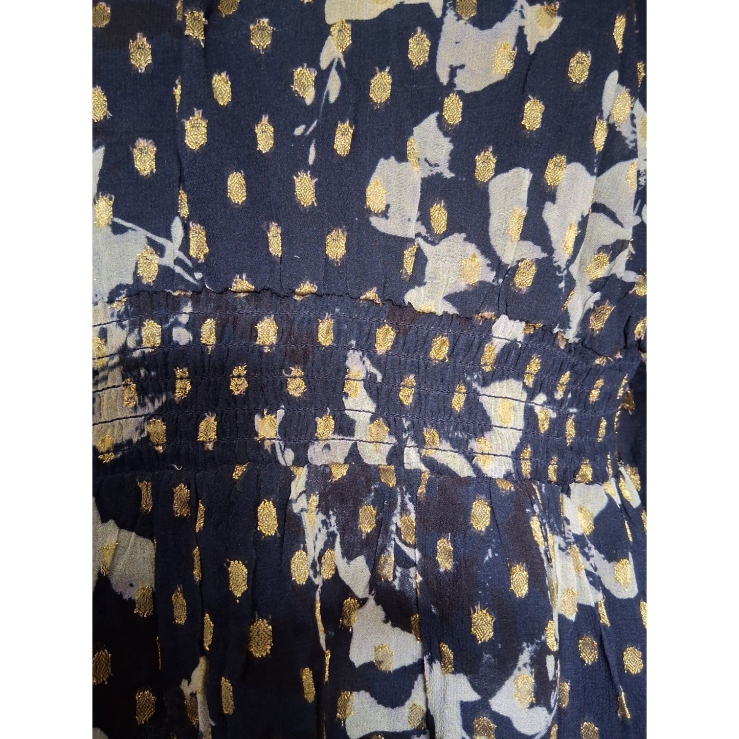 Navy fabric with white and gold pattern