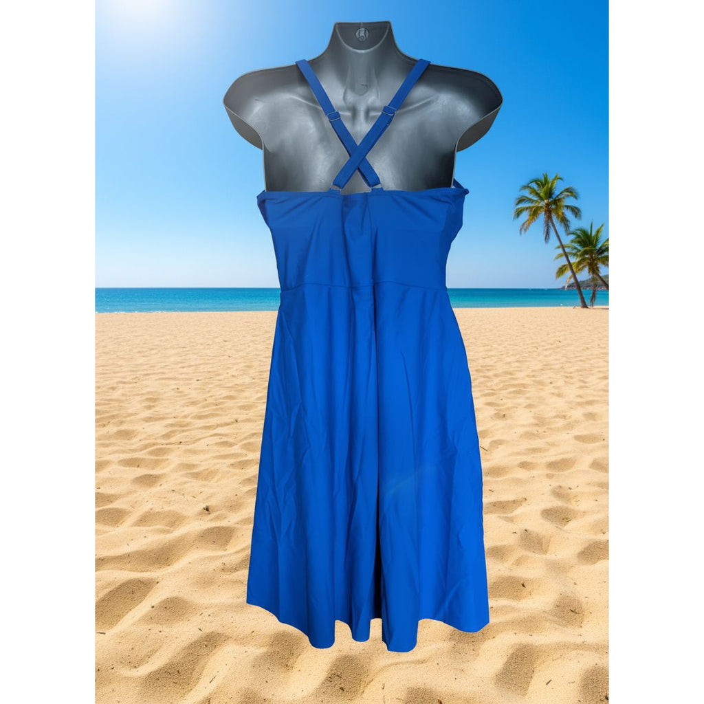 Blue dress on a mannequin at the beach