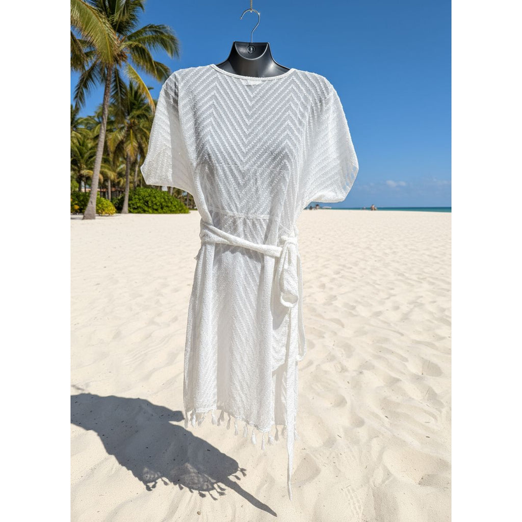 White and gray patterned dress on a mannequin 