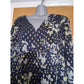 Navy blue fabric with white floral pattern on a mannequin