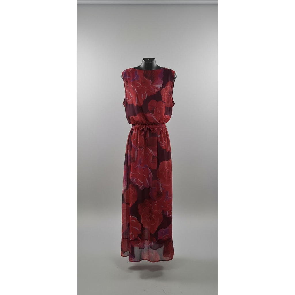 Red sofa in a room with geometric wall patterns