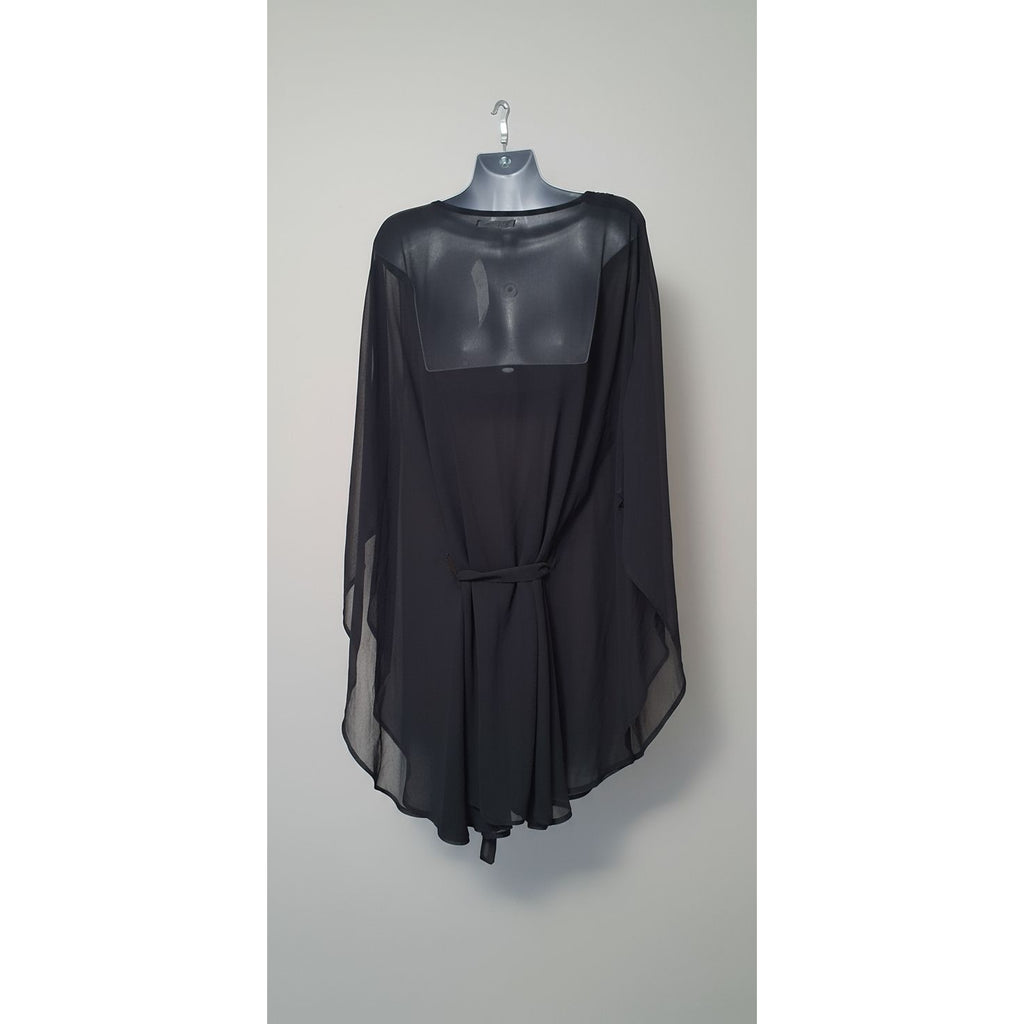 Black plastic bag with a valve on a wooden surface