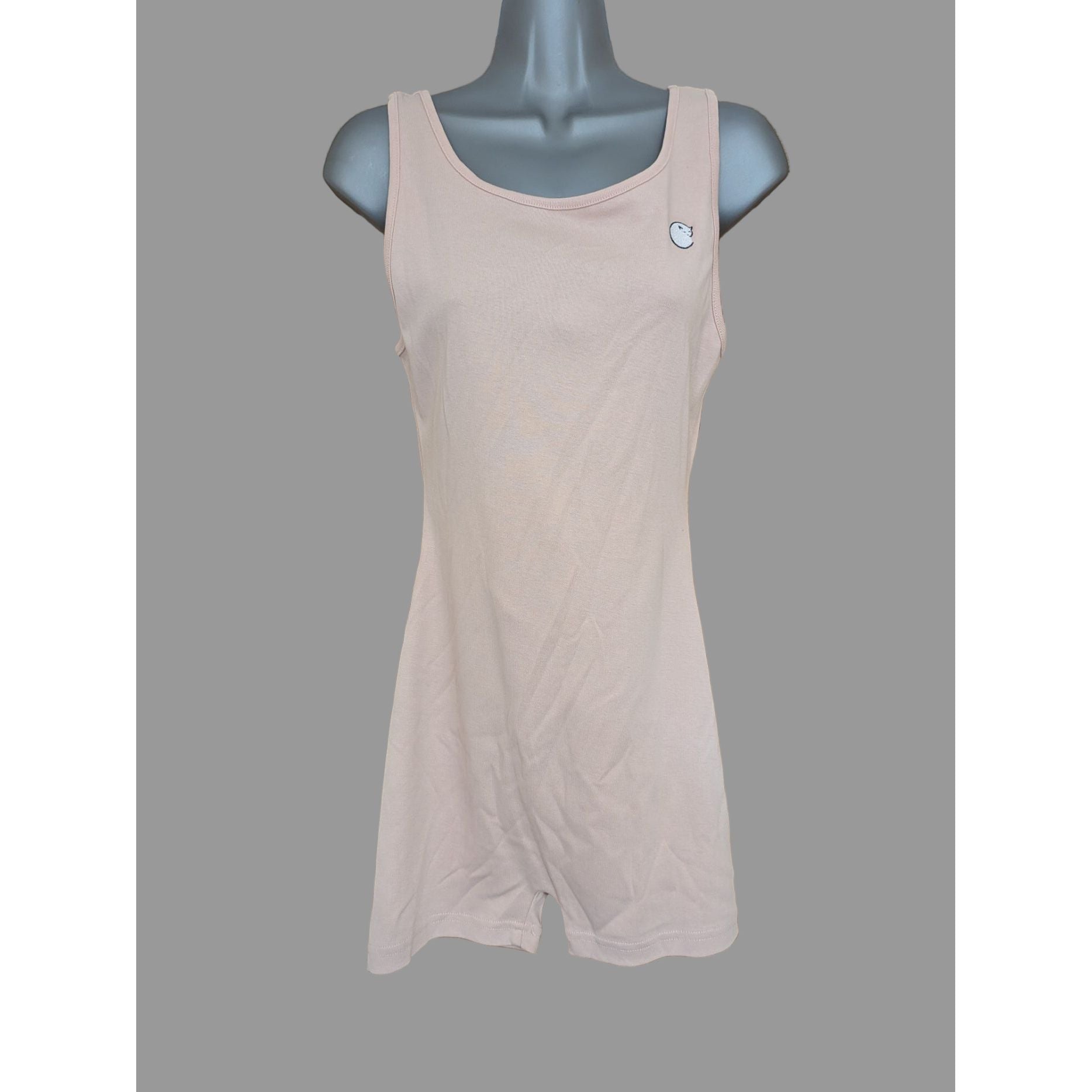 Beige tank top on a mannequin 
