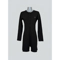 Black romper on a mannequin 