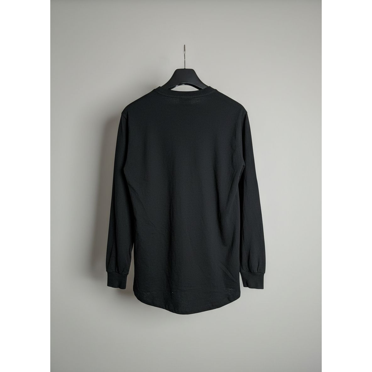 back of black long sleeved top