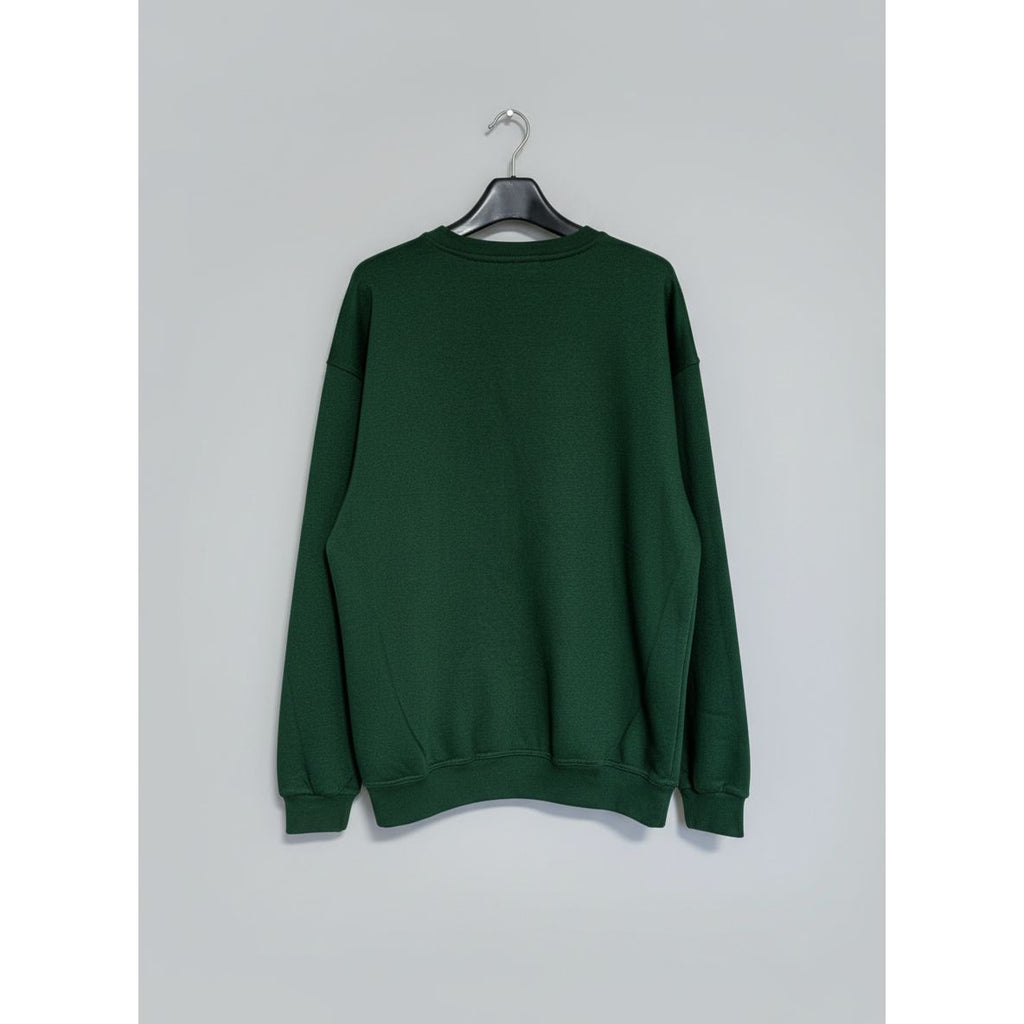 Green sweatshirt on a hanger 
