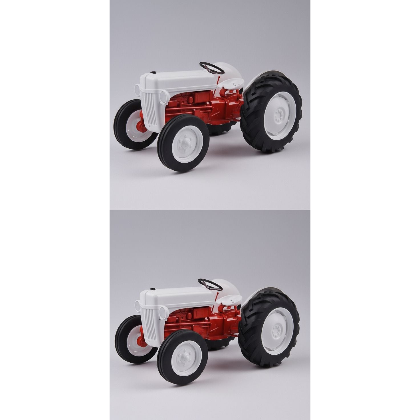 Model tractor kit with wheels and a partially assembled model on a gray background.